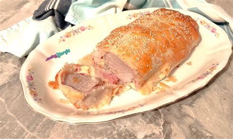 Filetto di maiale in crosta di speck che cuoce in forno