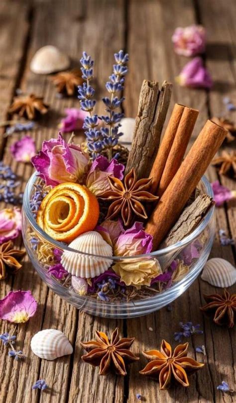 Composizione di un pot-pourri fatto in casa con petali di rosa essiccati, spezie e fiori secchi