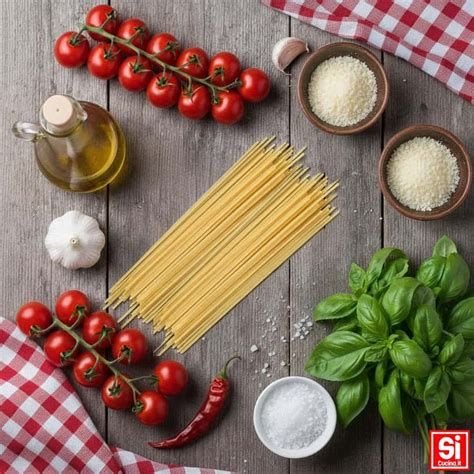 Ingredienti freschi per la pasta alla Napoletana: pomodori, cipolla, aglio, basilico fresco, olio extravergine d'oliva, sale, pepe