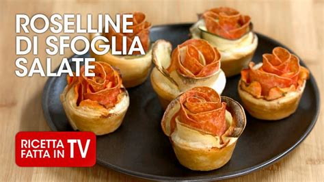 Roselline di pasta sfoglia salate pronte per essere infornate