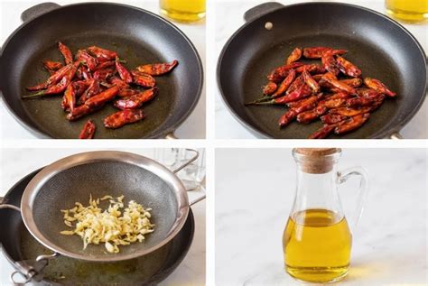 una bottiglia di vetro contenente olio e peperoncini secchi