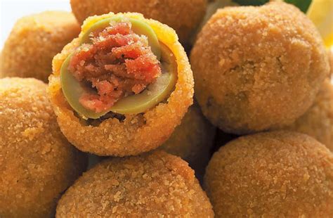 schema di come incidere e denocciolare un'oliva ascolana