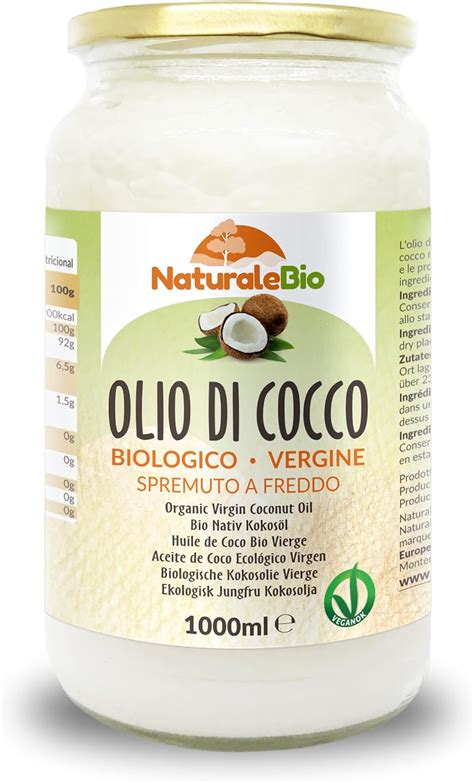 Immagine di olio di cocco biologico e non raffinato, in un barattolo di vetro.