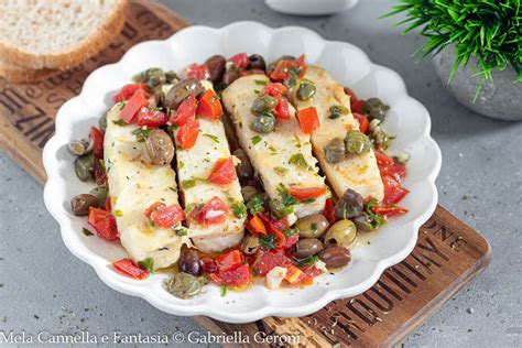 Filetto di ricciola in padella con pomodorini e olive