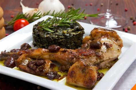 Pentola a pressione con coniglio e olive taggiasche in cottura