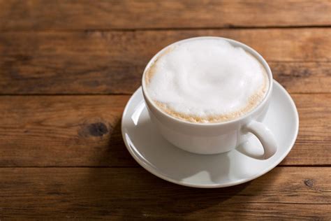 Immagine di un cappuccino perfetto con schiuma densa e cremosa.