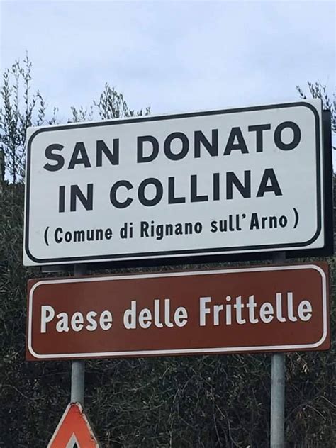 cartello stradale del borgo di San Donato in Collina con la dicitura 