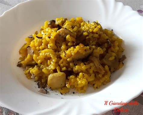 Un risotto cremoso con zafferano, tartufo e gorgonzola