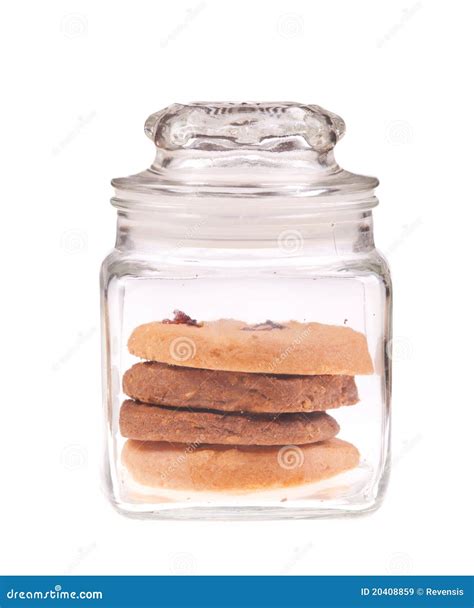 Vaso di vetro trasparente pieno di biscotti di meliga fatti in casa.