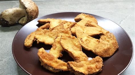 funghi impanati al forno su una teglia