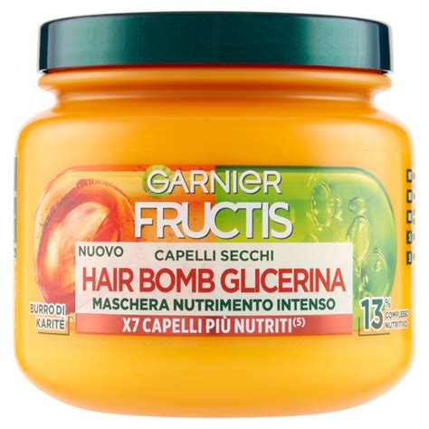 Foto di una maschera per capelli fatta in casa e un vasetto di scrub per labbra.