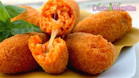 Immagine di supplì fatti con il risotto Knorr, dorati e croccanti, con un accenno di fontina filante.
