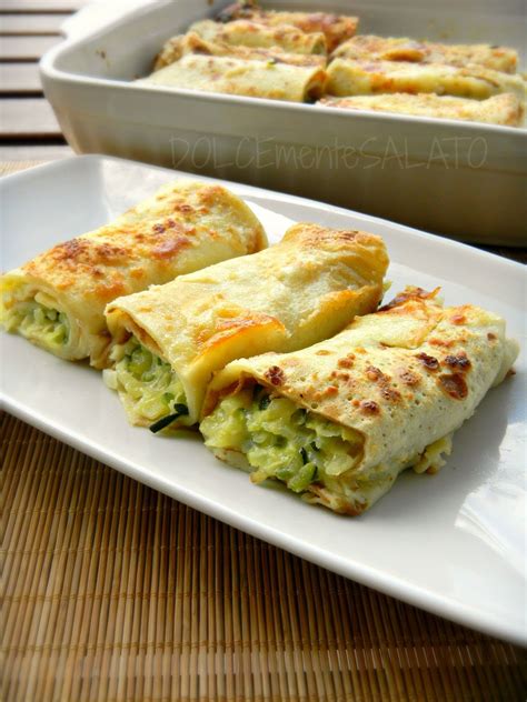 Collage di diverse varianti di crespelle farcite: verdure, salmone, prosciutto