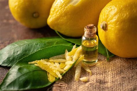Schema che illustra la diluizione corretta dell'olio essenziale di limone con olio vettore