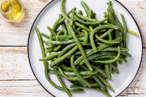Immagine di fagiolini in agrodolce serviti come contorno.