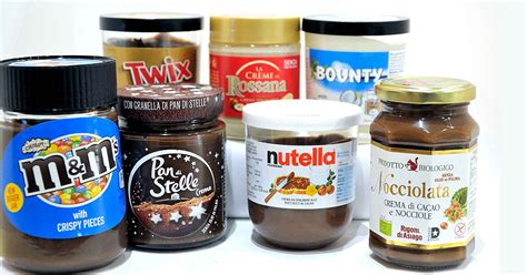 diversi tipi di creme spalmabili alla nocciola in barattoli