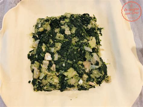 Immagine di merluzzo e spinaci in crosta di pasta sfoglia dorata