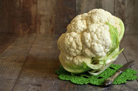 infografica con i diversi metodi per eliminare l'odore di cavolfiore in cottura: vapore, pane, aceto, limone, alloro, bicarbonato