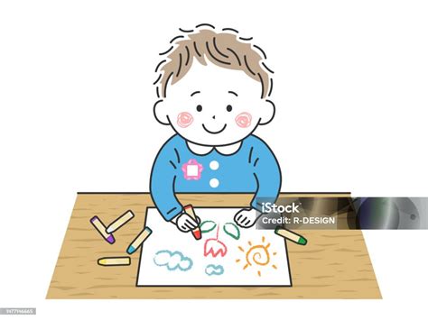 Bambino piccolo che disegna felicemente con i pastelli Giotto Be-be