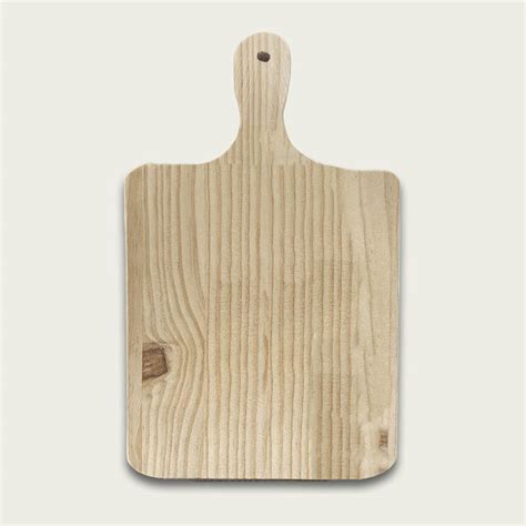 Dettaglio del coltello e della trama del legno del tagliere